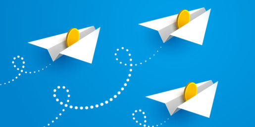 Three Paper Planes with coins going in the same direction against a blue background.