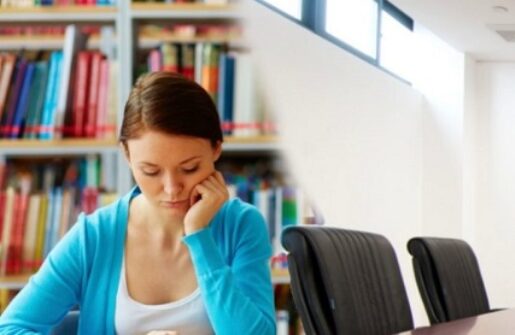 An individual studying at a desk.