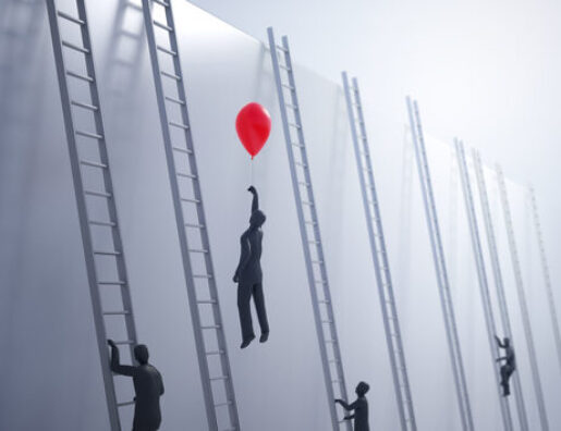 figure with red balloon floating above figures on ladders